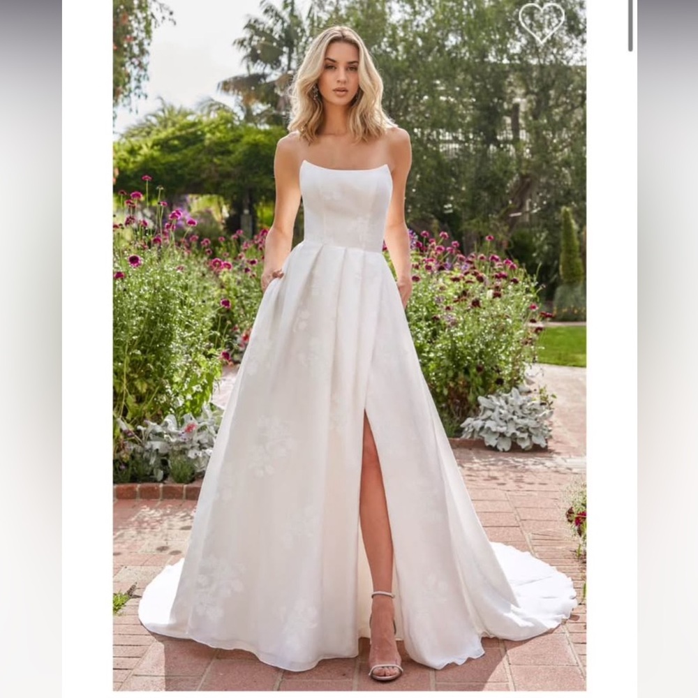 Romantic Organza Wedding Dress with Subtle Floral Design